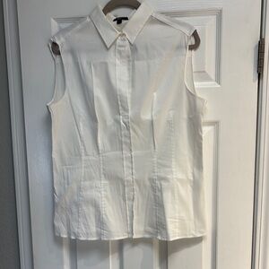 BOSS- Hugo Boss short white sleeve blouse with a zipper on each side.